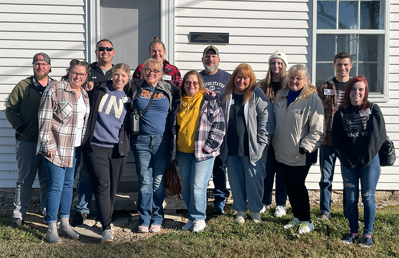 Members of the AWC Class pictured in front of the Quaker Hicksite Meeting House